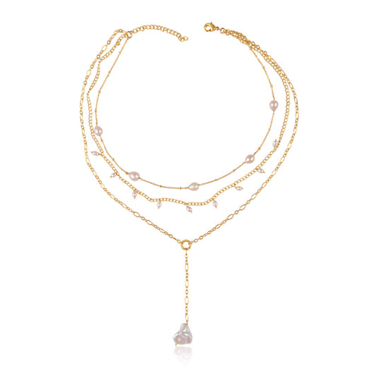 the showstopper pearl and gold necklace