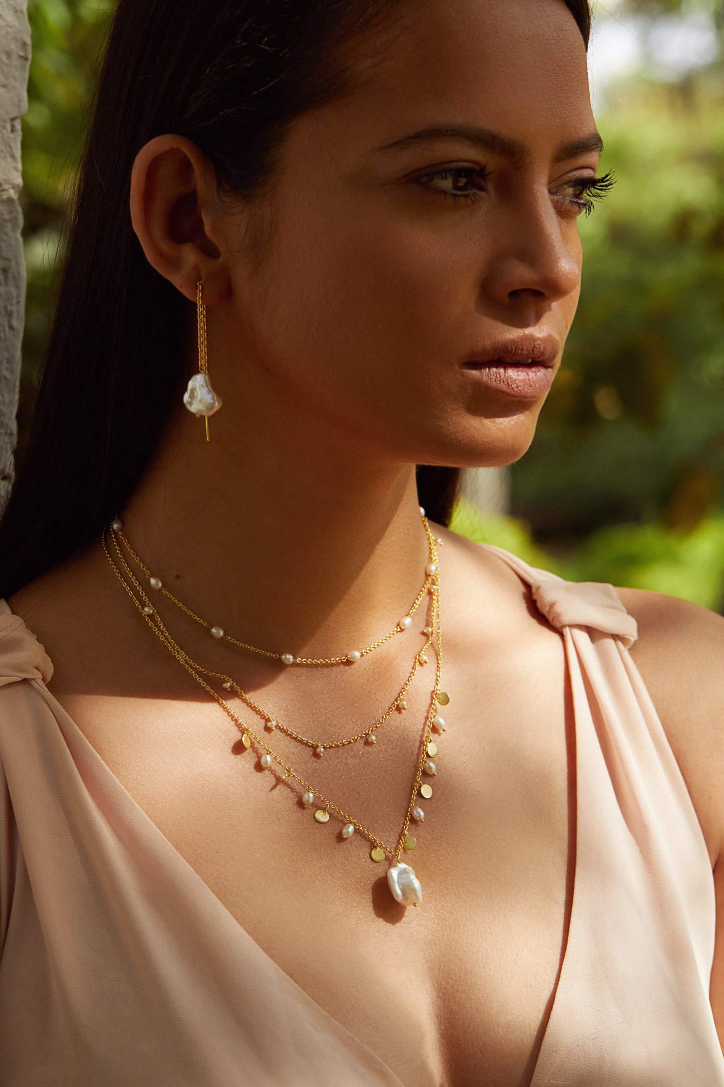 an elegant delight golden pearl necklace
