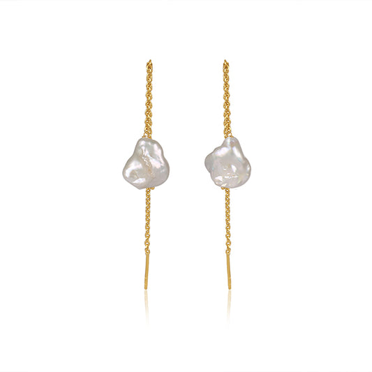 a divine allure golden pearl earrings.
