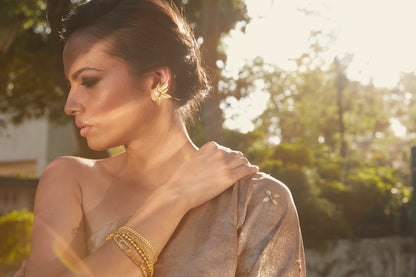 The modern girl's bold and beautiful golden pearl earrings.