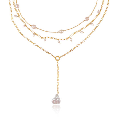 the showstopper pearl and gold necklace