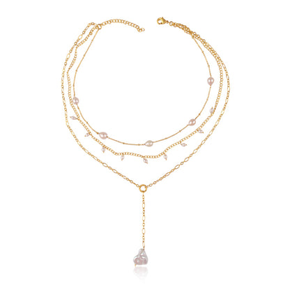 the showstopper pearl and gold necklace