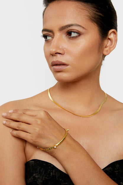 the pearl princess golden bangle