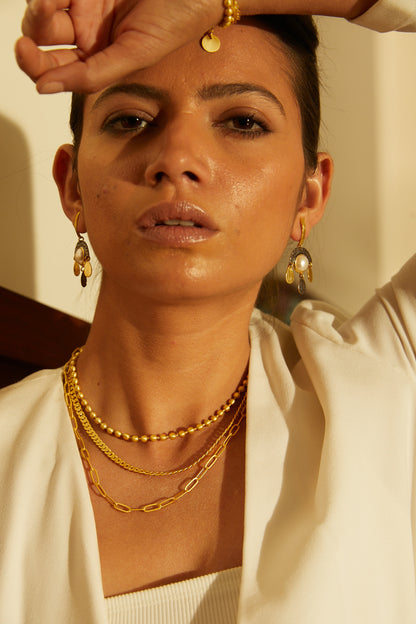 the reminiscence of nature pearl earrings.
