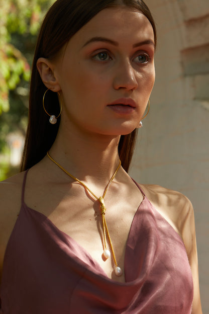 the geometric chic pearl hoop earrings.