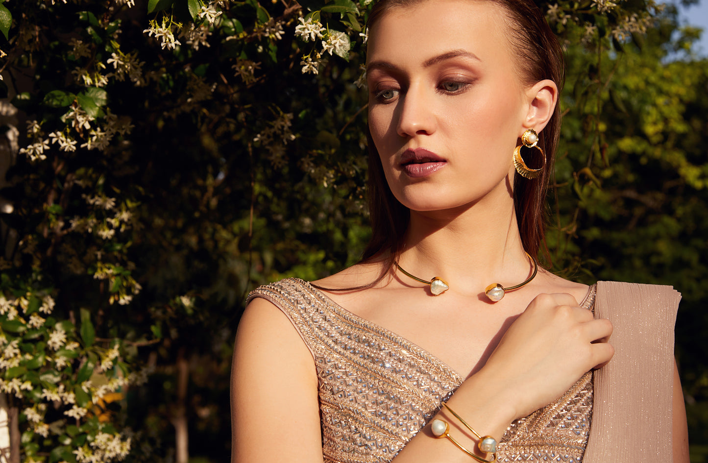 eternally stylish golden pearl necklace