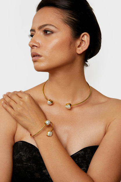 eternally stylish golden pearl necklace
