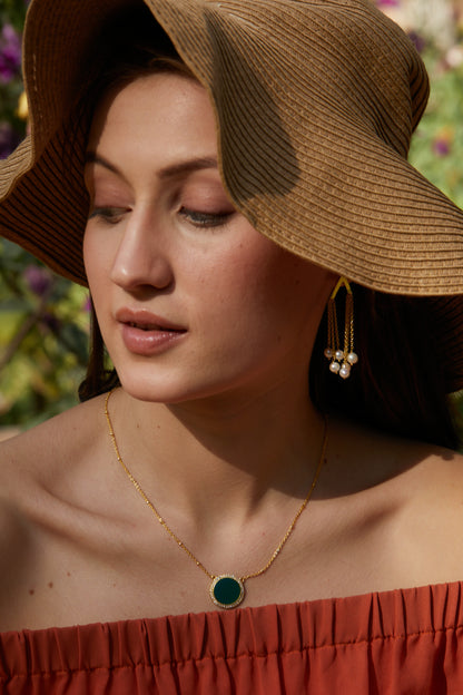 an elegant delight  golden pearl tassel earrings.