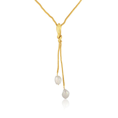 the sleek dazzling golden pearl necklace