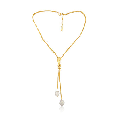 the sleek dazzling golden pearl necklace