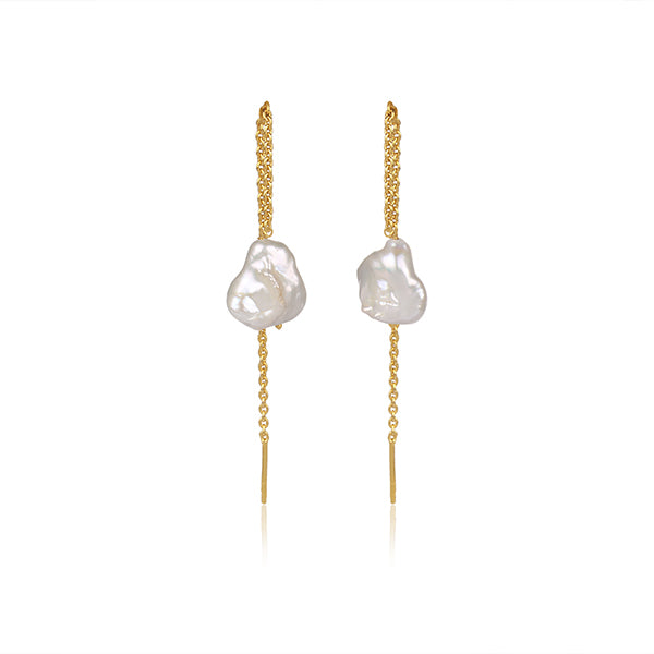 a divine allure golden pearl earrings.