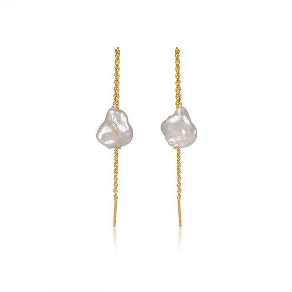 a divine allure golden pearl earrings.