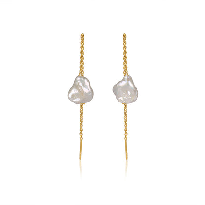 a divine allure golden pearl earrings.
