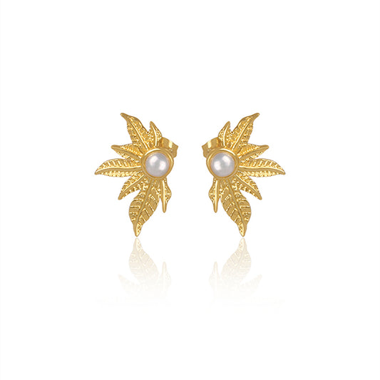 simplicity is endearing, precious golden pearl earrings.
