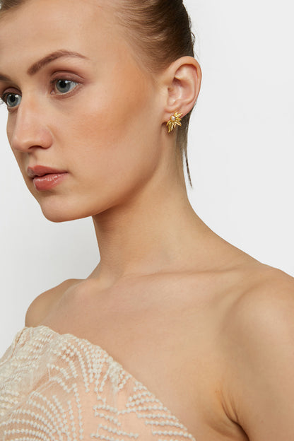 simplicity is endearing, precious golden pearl earrings.