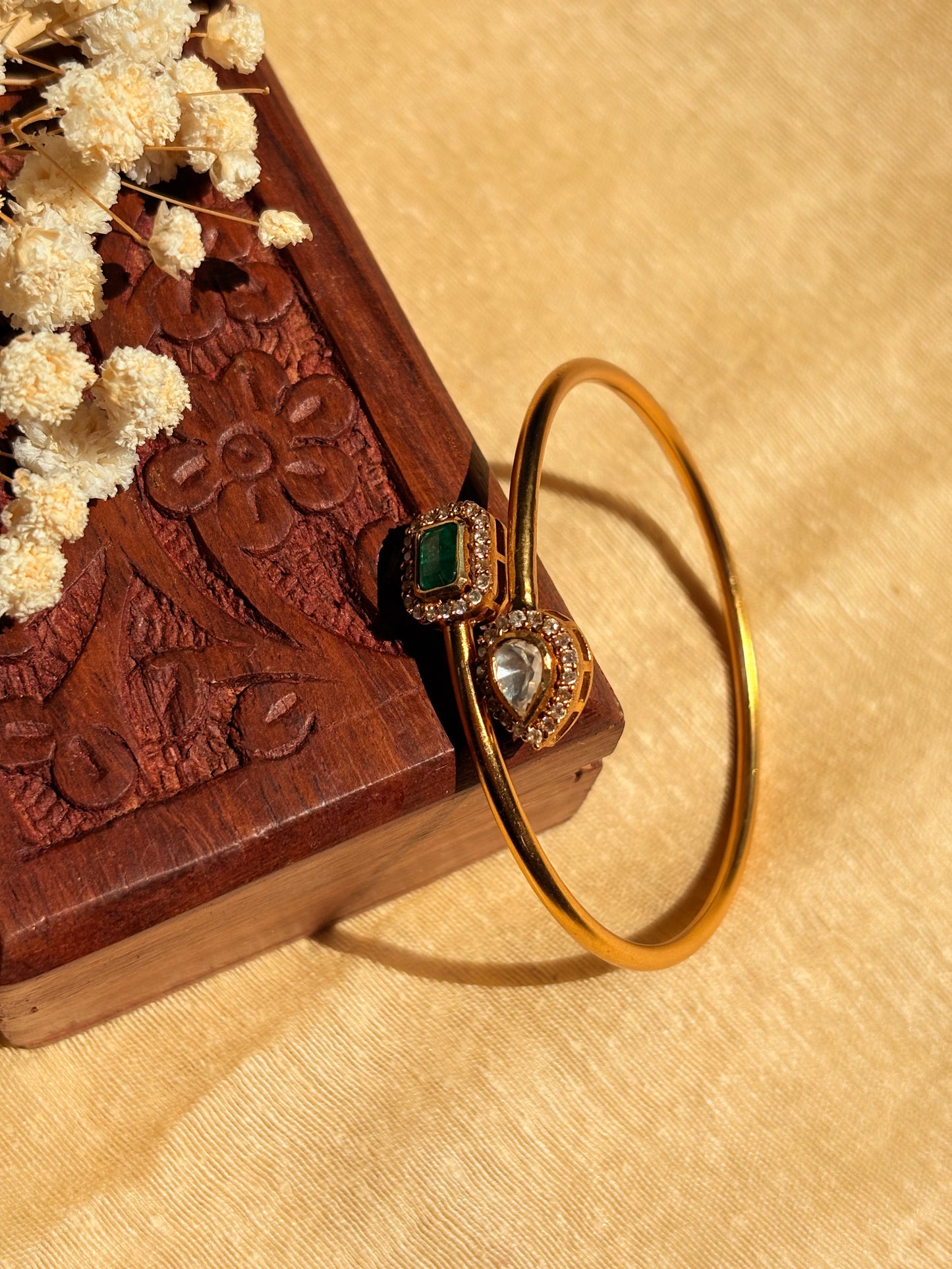 The regal emerald trio cuff