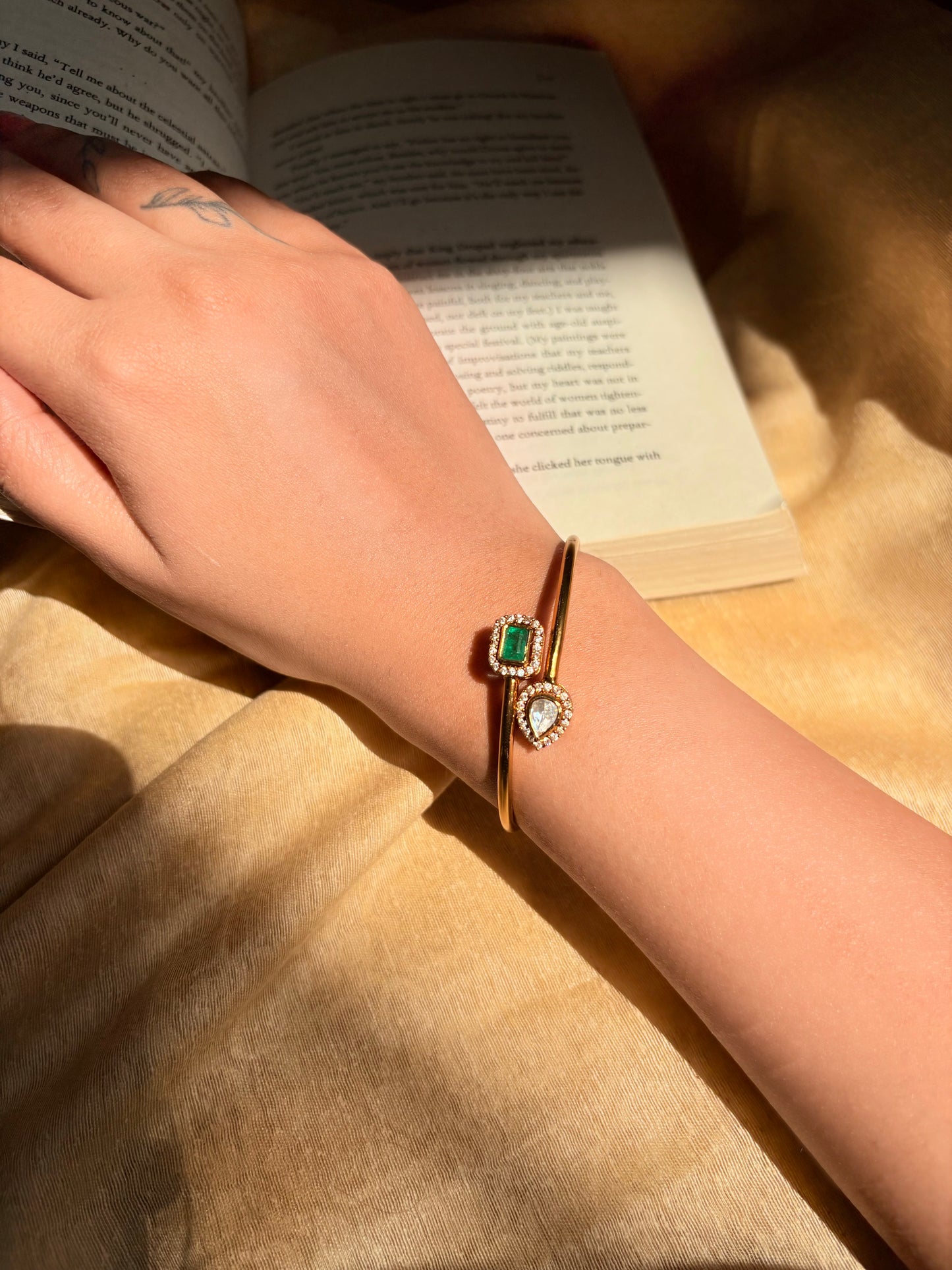 The regal emerald trio cuff