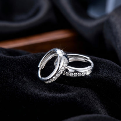 Silver Cubic Zirconia (CZ) Huggie Hoop Earrings.