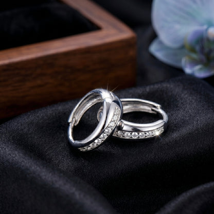 Silver Cubic Zirconia (CZ) Huggie Hoop Earrings.