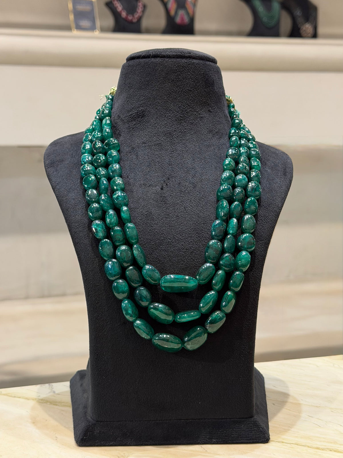 Emerald Cascade – Three-Strand Gemstone Necklace
